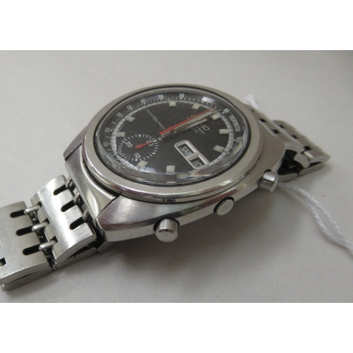 211 - A 1970s Seiko automatic chronograph stainless steel cased and strapped wristwatch, faced by a baton ... 