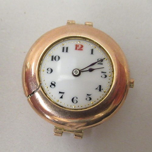 218 - A 9ct gold cased and strapped (broken) wristwatch, faced by an Arabic dial; and a (possibly) Contine... 