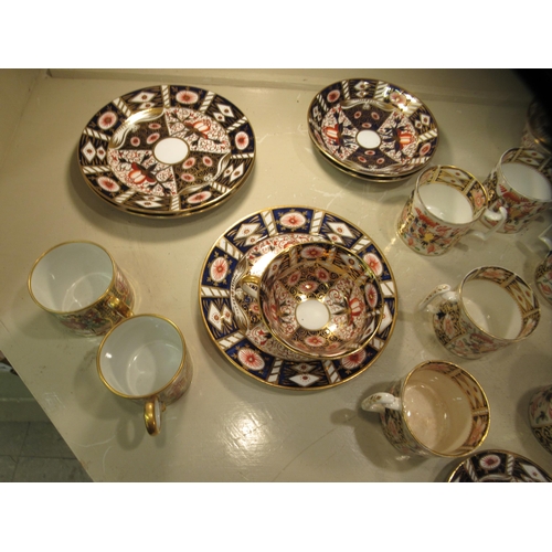 221 - 19thC ceramics: to include Derby Imari pattern china coffee cans and saucers