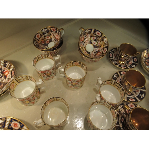 221 - 19thC ceramics: to include Derby Imari pattern china coffee cans and saucers