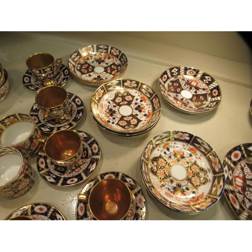 221 - 19thC ceramics: to include Derby Imari pattern china coffee cans and saucers