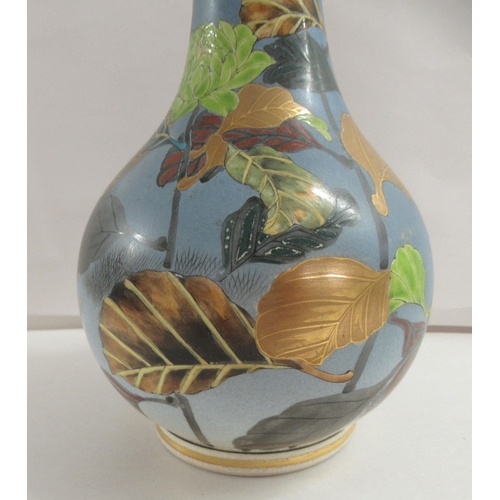 228 - An early 20thC Japanese Satsuma porcelain vase, decorated with birds, flora and leaves  18