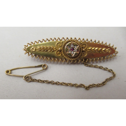 232 - A late Victorian 15ct gold brooch, set with diamonds and a ruby