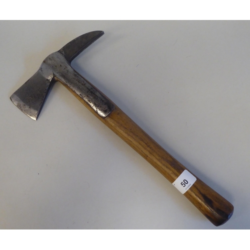 254 - A vintage fireman's axe, the steel head stamped W-Gilpin, made in England, on a wooden handle