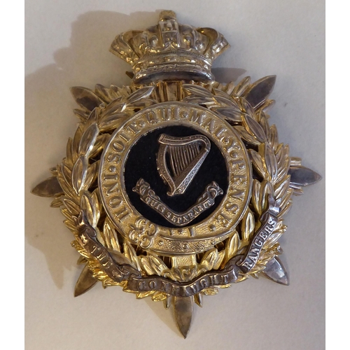 256 - A Connaught Rangers military helmet plate (Please Note: this lot is subject to the statement made in... 