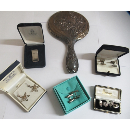 26 - Silver collectables and items of personal ornament: to include a money clip, a hand mirror and a pai... 