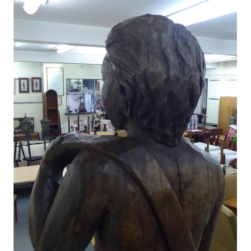 281 - A carved and stained wood statue, a standing male nude  36