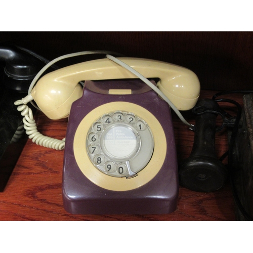 294 - Three dissimilar telephone handsets: to include an early 20thC wall mounted example with a dial-up m... 