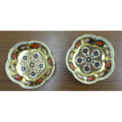 3 - Decorative ceramics: to include a pair of late 19thC Limoges porcelain, wavy edged plates, decorated... 