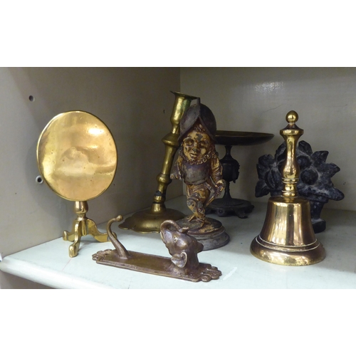 300 - Decorative brassware: to include a pair of early 20thC prancing horse door porters  10