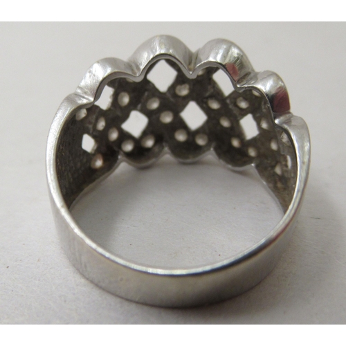 306 - A 14ct white gold lattice design ring, set with white stones