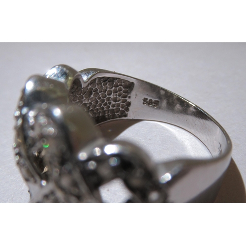 306 - A 14ct white gold lattice design ring, set with white stones