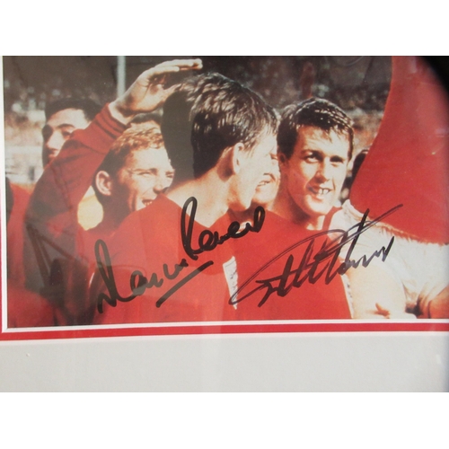 33 - A photographic print celebrating England's 4-2 1966 World Cup victory, bearing the signatures of Sir... 