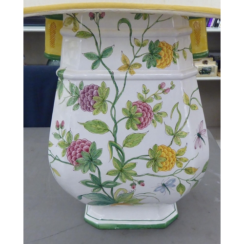 334 - An Italian fiance, vase design lamp base, decorated in colours with trailing flora and insects  26