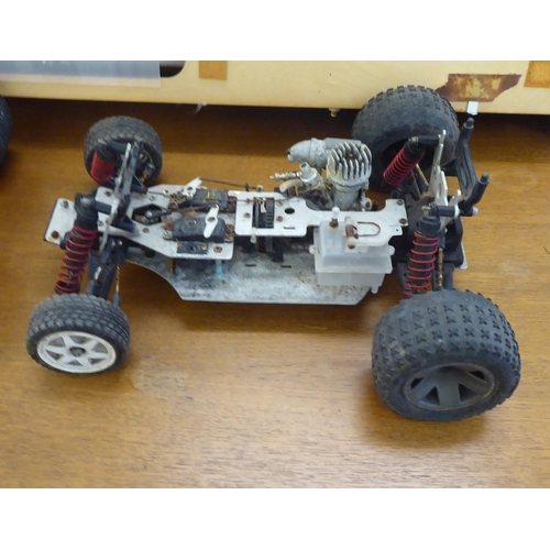 364 - Three battery powered remote control car chassis with motors and wheels(Completeness not guaranteed)... 