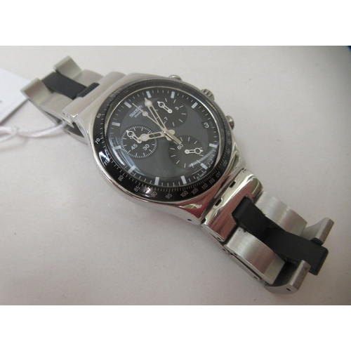 383 - A Swatch stainless steel cased wristwatch, faced by a baton dial with the subsidiaries 