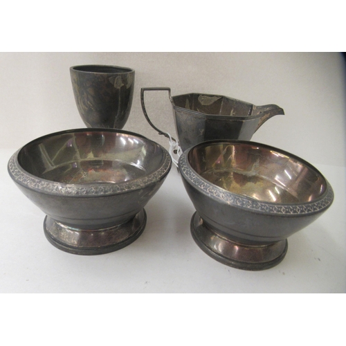 393 - Silver tableware: to include an egg cup and a cream jug  mixed marks