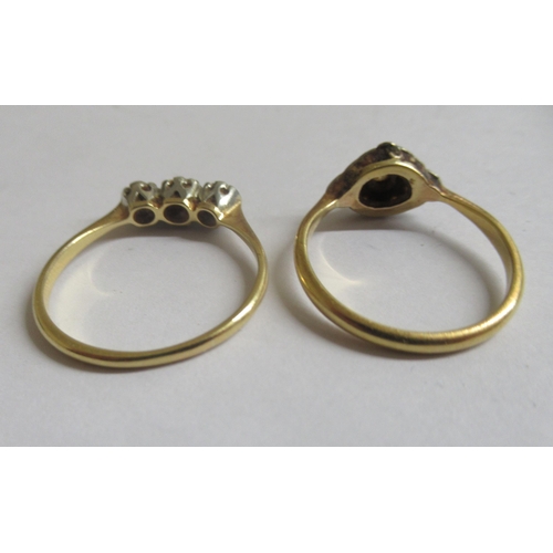 40 - Two gold rings, set with diamonds  both stamped 18ct