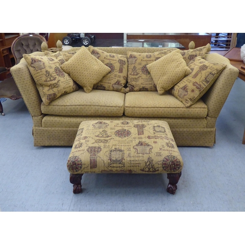 405 - A modern three person, drop-end settee, upholstered in a biscuit coloured fabric, on casters  78