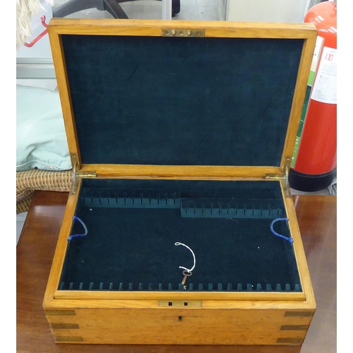 408 - A late Victorian brass inlaid canteen box with a hinged lid, enclosing a tray fitted interior  ... 