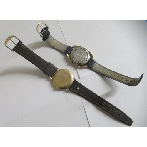 45 - A Favre-Leuba of Geneve Seabird wristwatch, faced by a baton dial, on a black hide strap; and a 9ct ... 