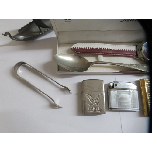 53 - Four various pocket lighters; a Markato watch  cased; and decorative metalware 