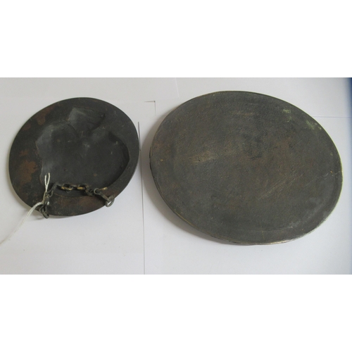 58 - A late 19thC bronze disc, depicting a profile of a boy  5