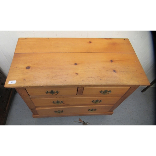 61 - A waxed pine dressing chest, comprising two short/two long drawers with brass handles, raised on tur... 