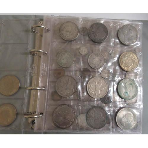 65 - An album coin collection, mainly George III to Queen Elizabeth II, featuring crowns, shillings and f... 