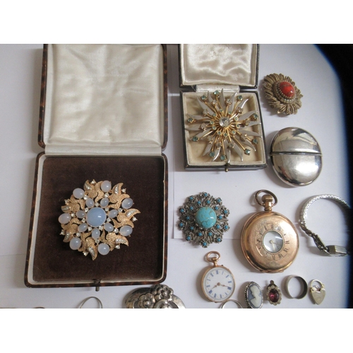 72 - 20thC items of personal ornament and pocket watches: to include a Trifari brooch; and a gold plated ... 