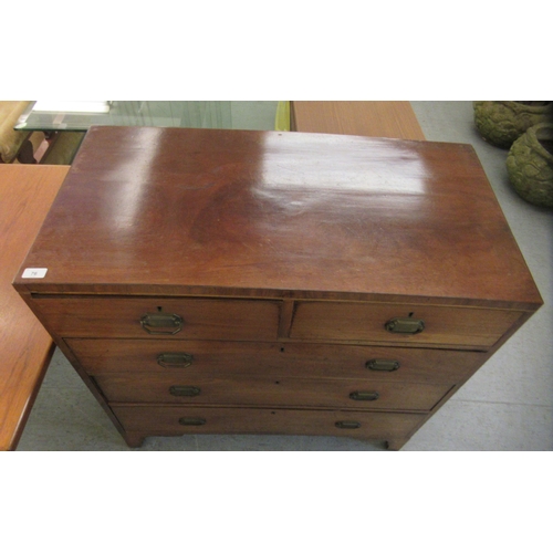 76 - A 19thC mahogany dressing chest with two short/three graduated long lockable drawers with brass bail... 