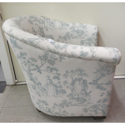 8 - A mid 20thC tub design bedroom chair, upholstered in printed green and cream coloured fabric with a ... 