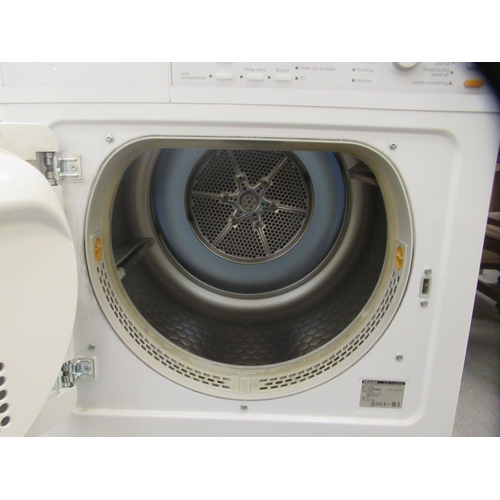 84 - A Miele T8722 vented tumble dryer  33.5