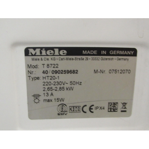 84 - A Miele T8722 vented tumble dryer  33.5