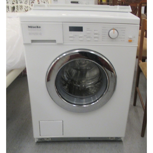 85 - A Miele Platinum Plus washing machine  33.5