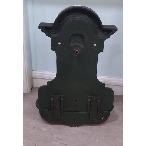 96 - A Georgian inspired cast iron backplate with a two direction front facing tap, over a grill and rese... 