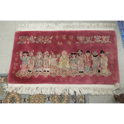 78 - Four similar small Chinese wash rugs  various sizes