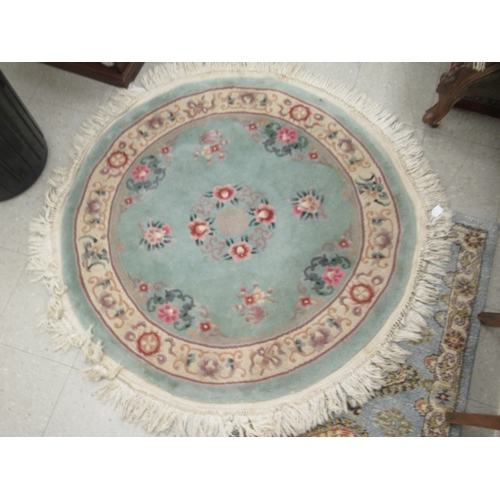 78 - Four similar small Chinese wash rugs  various sizes