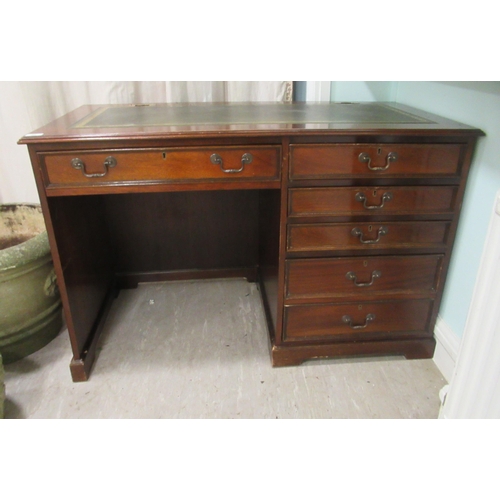 98 - A modern mahogany, one piece, single pedestal desk, on a plinth  31