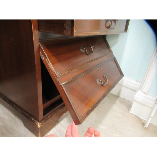 98 - A modern mahogany, one piece, single pedestal desk, on a plinth  31