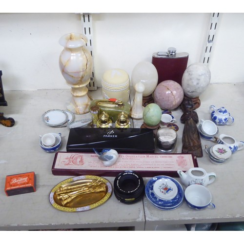 177 - Mixed collectables: to include Chinese hardstone eggs; a hip flask; two Parker pens; and miniature c... 