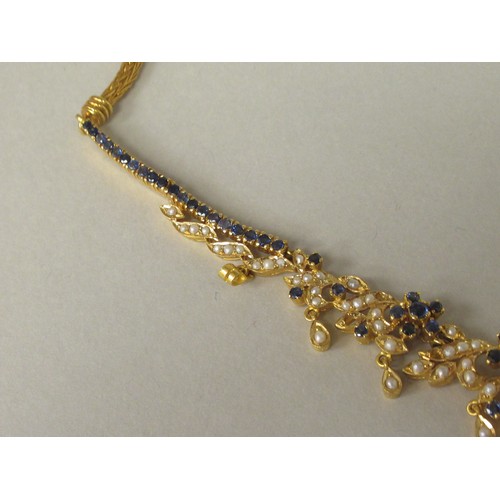 315 - A bespoke yellow metal (probably 22ct gold) suite of jewellery, set with sapphires and seed pearls, ... 