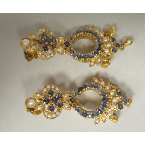 315 - A bespoke yellow metal (probably 22ct gold) suite of jewellery, set with sapphires and seed pearls, ... 