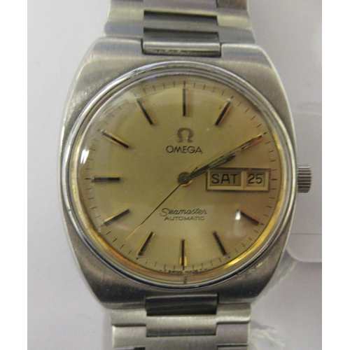 100 - A vintage Omega Seamaster automatic stainless steel cased bracelet watch, faced by a gilt baton dial... 