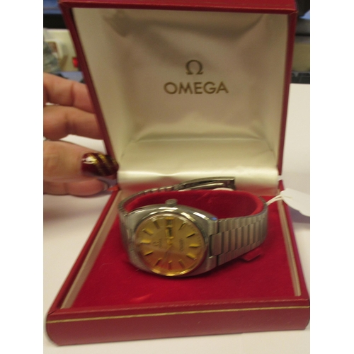 100 - A vintage Omega Seamaster automatic stainless steel cased bracelet watch, faced by a gilt baton dial... 