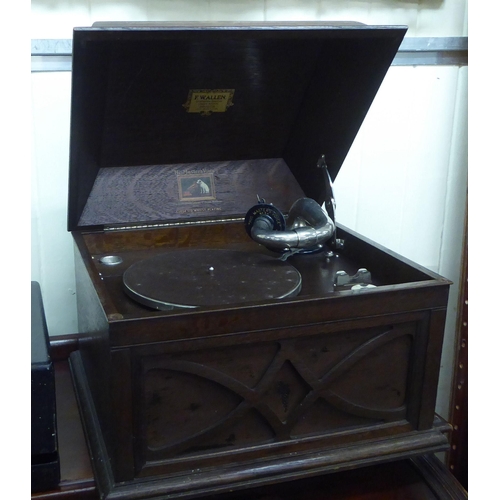 22 - A vintage HMV oak cased table-top wind-up gramophone, retailed by FW Allen of Bristol