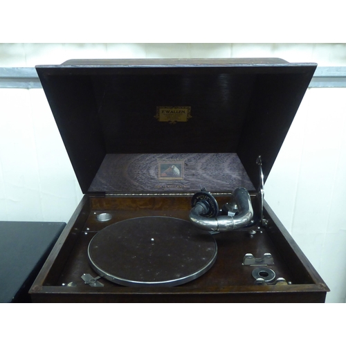 22 - A vintage HMV oak cased table-top wind-up gramophone, retailed by FW Allen of Bristol