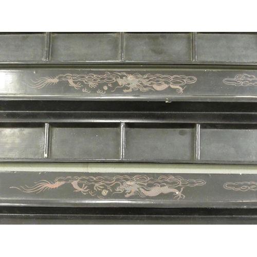 28 - A set of four black painted Mah-jong tile racks with dragon and cloud decoration  16