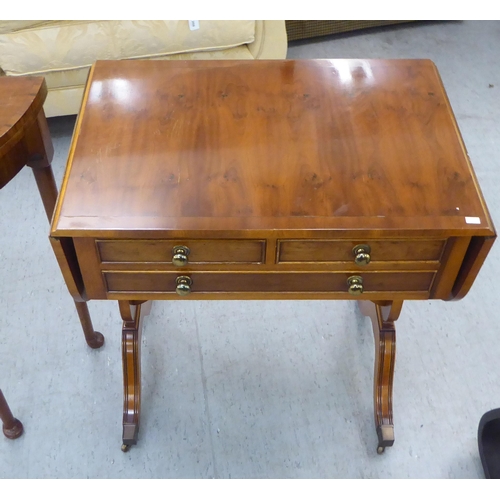 283 - Small furniture: to include a 1930s walnut demi-lune card table with a foldover top, raised on turne... 