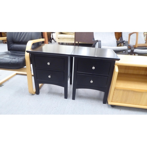 284 - Small furniture: to include a pair of black painted, two drawer bedside chests, raised on bracket fe... 